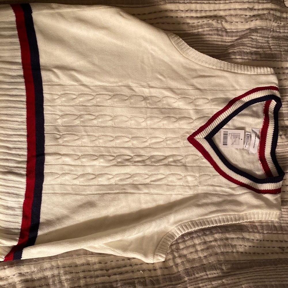 Selling Urban Outfitters sweater vest, size XL in cream color.